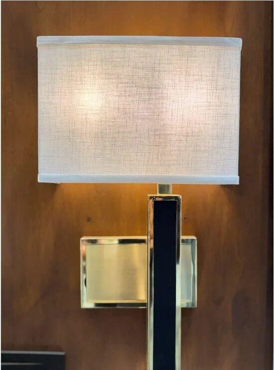 Brass and linen wall sconce