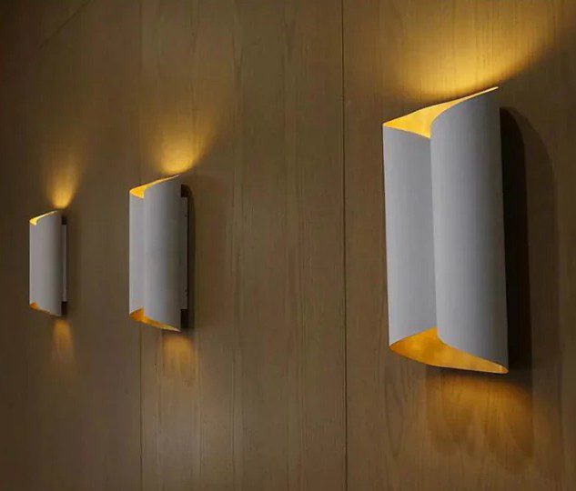 Row of glowing corridor sconces